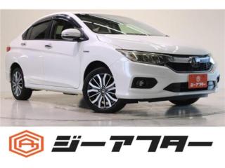 グレイス 1.5 ハイブリッド EX ホンダセンシング 4WD 禁煙車 純正ナビ 寒冷地仕様 温熱ハーフレザーシート レーダークルーズコントロール ホンダセンシング 純正16インチアルミホイール Bluetoo